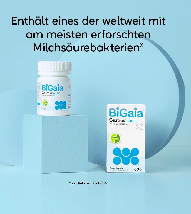 BiGaia Gastrus PURE Packung und Dose auf blauem Hintergrund mit dem Text: Enthält eines der weltweit am meisten erforschten Milchsäurebakterien.